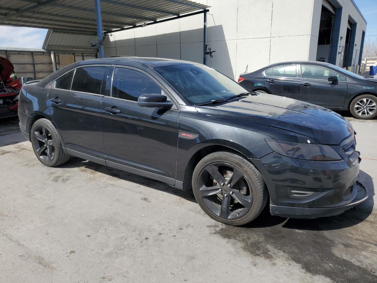 2010 Ford Taurus VIN 1FAHP2KT1AG114590 Copart auction photo, front end / minor dent/scratches damage thumbnail 4