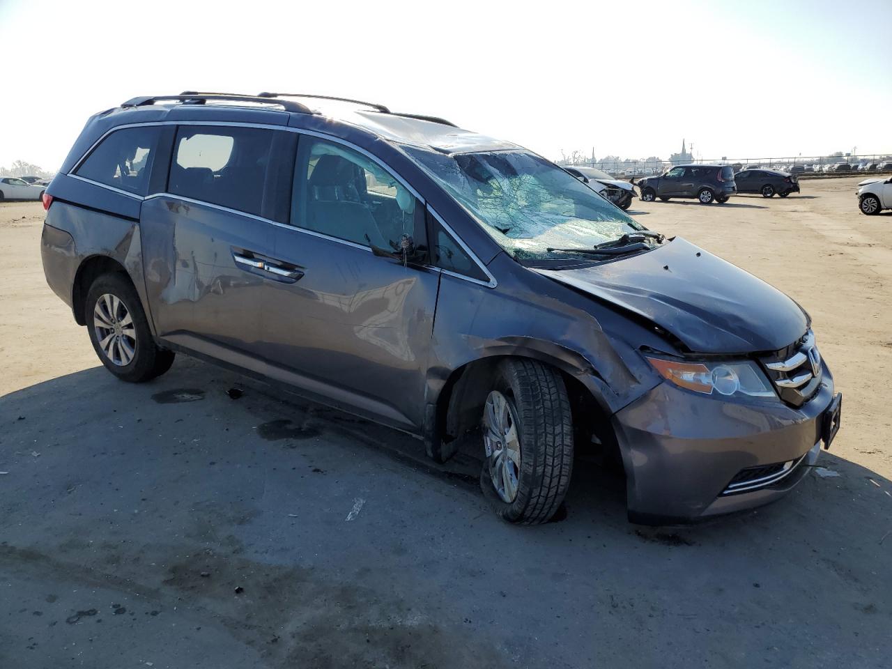 2015 Honda Odyssey VIN 5FNRL5H47FB068891 Copart auction photo, rollover damage thumbnail 4