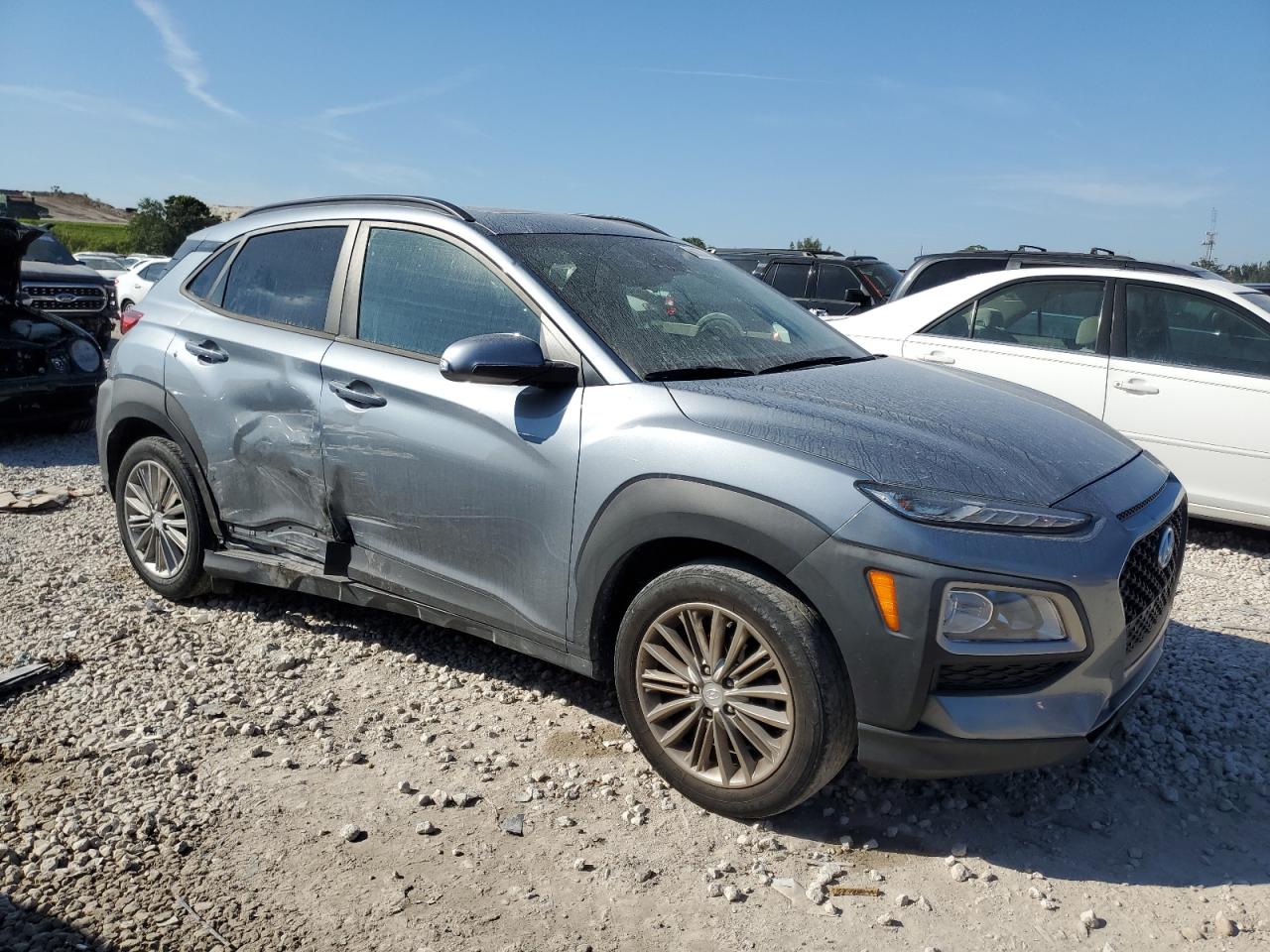 2019 Hyundai Kona VIN KM8K62AA4KU265831 Copart auction photo, side / minor dent/scratches damage thumbnail 4