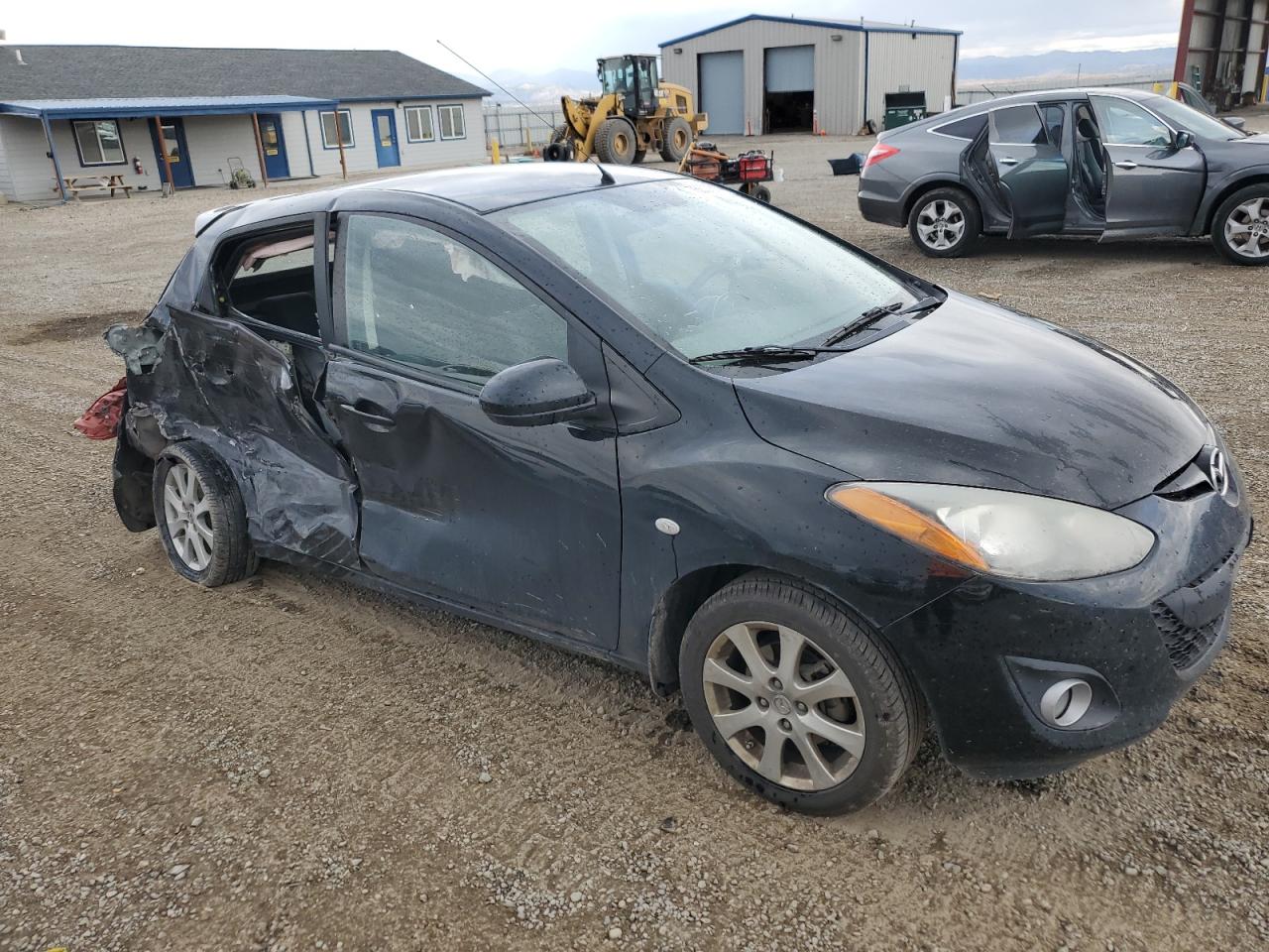 2011 Mazda 2 VIN JM1DE1HY2B0116998 Copart auction photo, side / rear end damage thumbnail 4