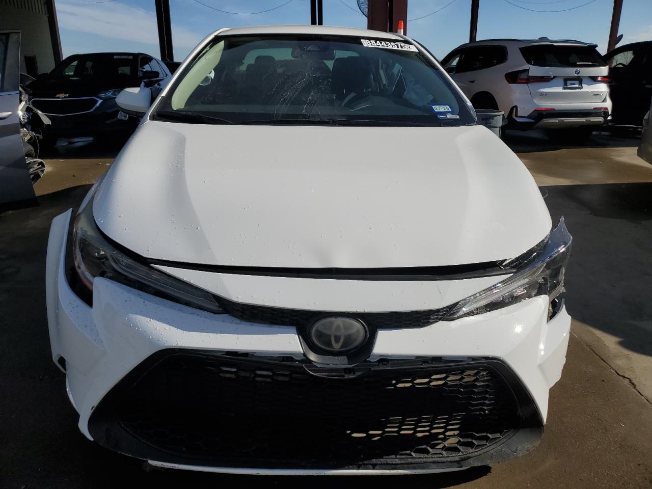 2020 Toyota Corolla VIN JTDDPRAE7LJ075028 Copart auction photo, side / front end damage thumbnail 5