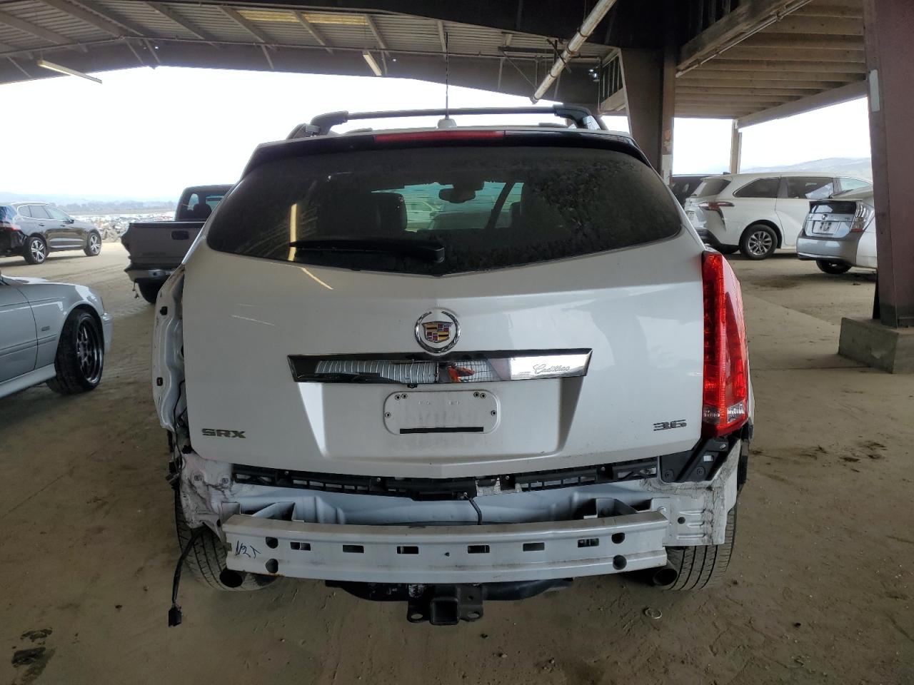 2015 Cadillac SRX VIN 3GYFNDE32FS522436 Copart auction photo, rear end damage thumbnail 6
