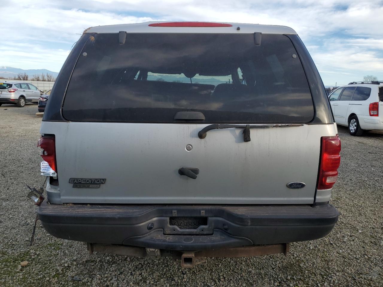 2001 Ford Expedition VIN 1FMPU16L71LA84761 Copart auction photo, rollover damage thumbnail 6