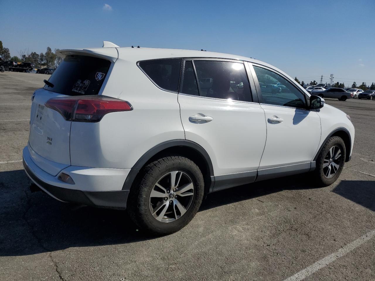 2018 Toyota RAV 4 VIN 2T3RFREV3JW811805 Copart auction photo, front end damage thumbnail 3