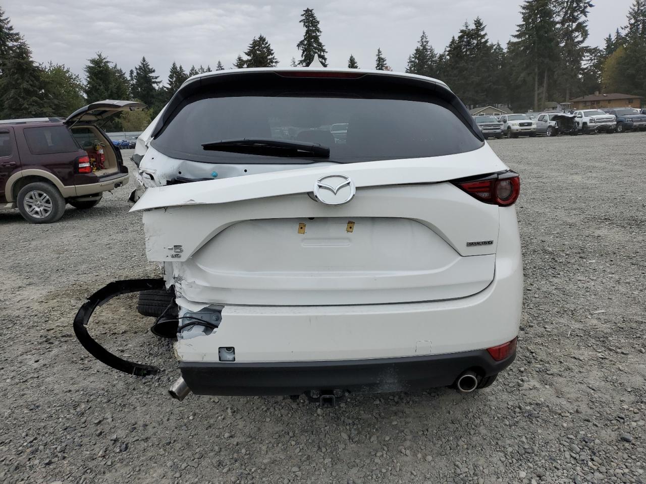 2021 Mazda CX-5 VIN JM3KFBDM4M1426152 Copart auction photo, all over damage thumbnail 6