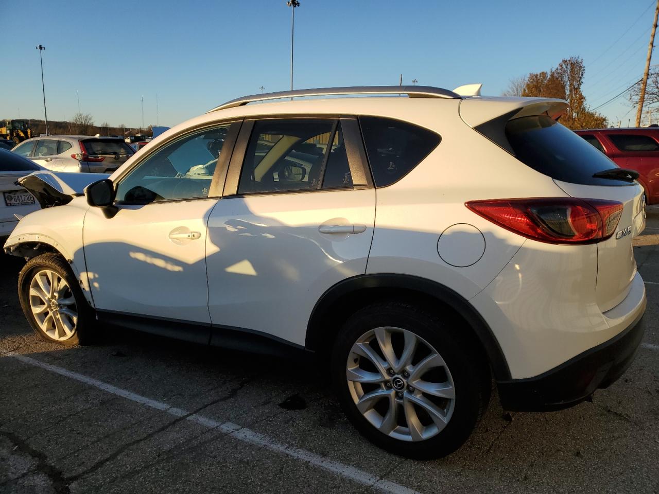 2015 Mazda CX-5 VIN JM3KE2DY4F0503472 Copart auction photo, front end / undercarriage damage thumbnail 2