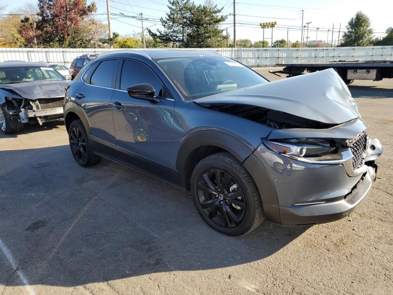 2023 Mazda CX-30 VIN 3MVDMBCM1PM583555 Copart auction photo, front end / side damage thumbnail 4