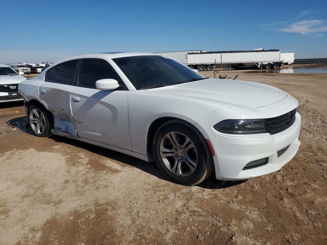 2020 Dodge Charger VIN 2C3CDXBGXLH207424 Copart auction photo, rear end / side damage thumbnail 4