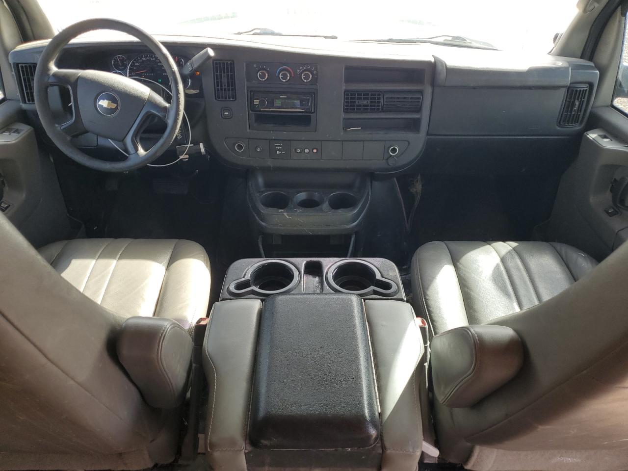 2014 Chevrolet Express VIN 1GCWGGFA7E1147125 Copart auction photo, rear end / all over damage thumbnail 8