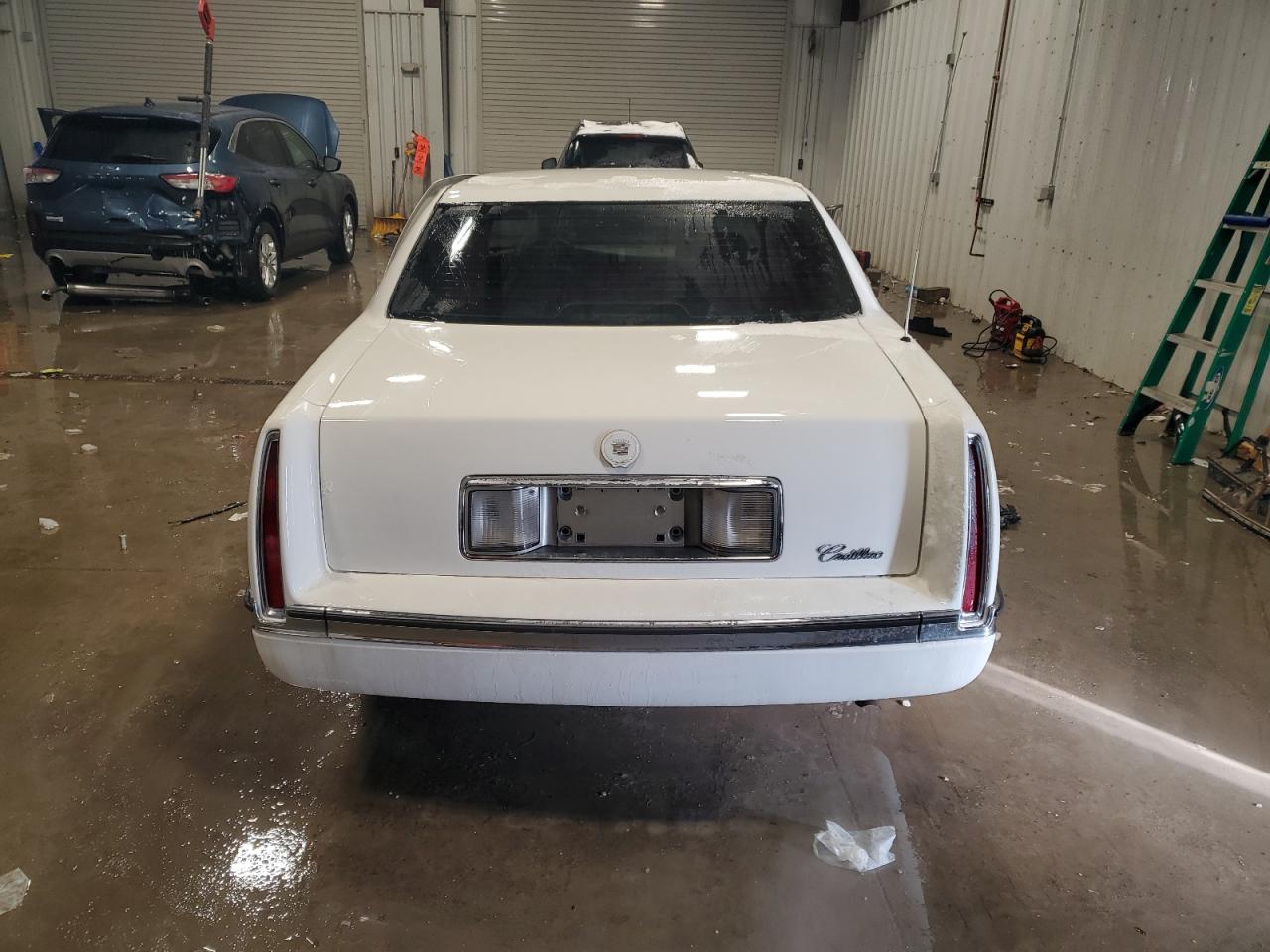 1994 Cadillac De Ville VIN 1G6KD52B5RU239576 Copart auction photo, side damage thumbnail 6