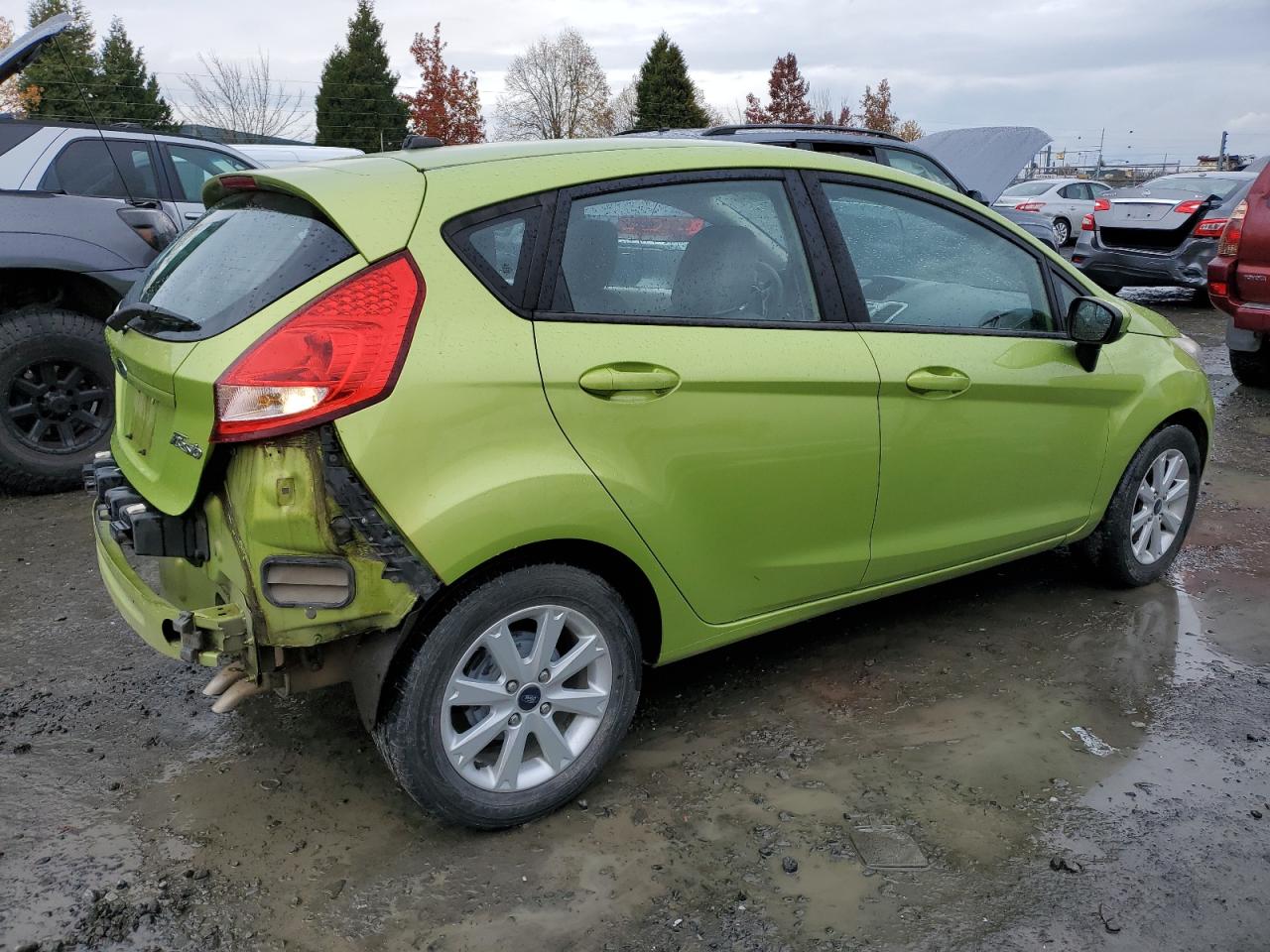 2011 Ford Fiesta VIN 3FADP4EJ7BM112080 Copart auction photo, all over damage thumbnail 3
