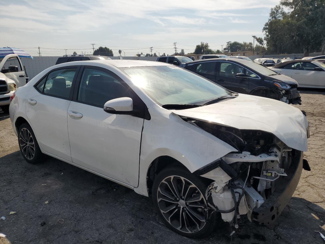 2015 Toyota Corolla VIN 5YFBURHE1FP311825 Copart auction photo, front end damage thumbnail 4