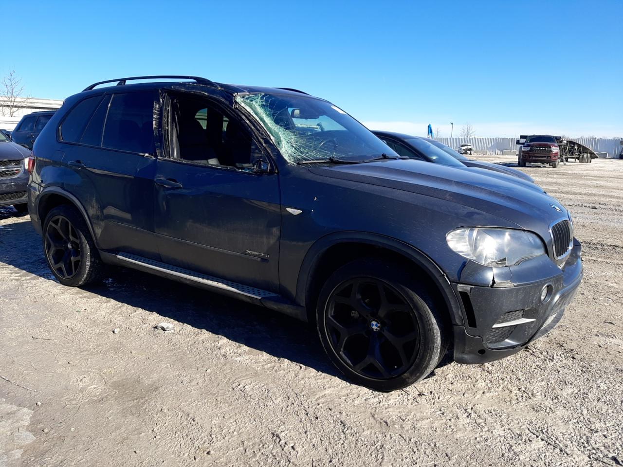 2011 BMW X5 VIN 5UXZV4C58BL410634 Copart auction photo, rollover damage thumbnail 4