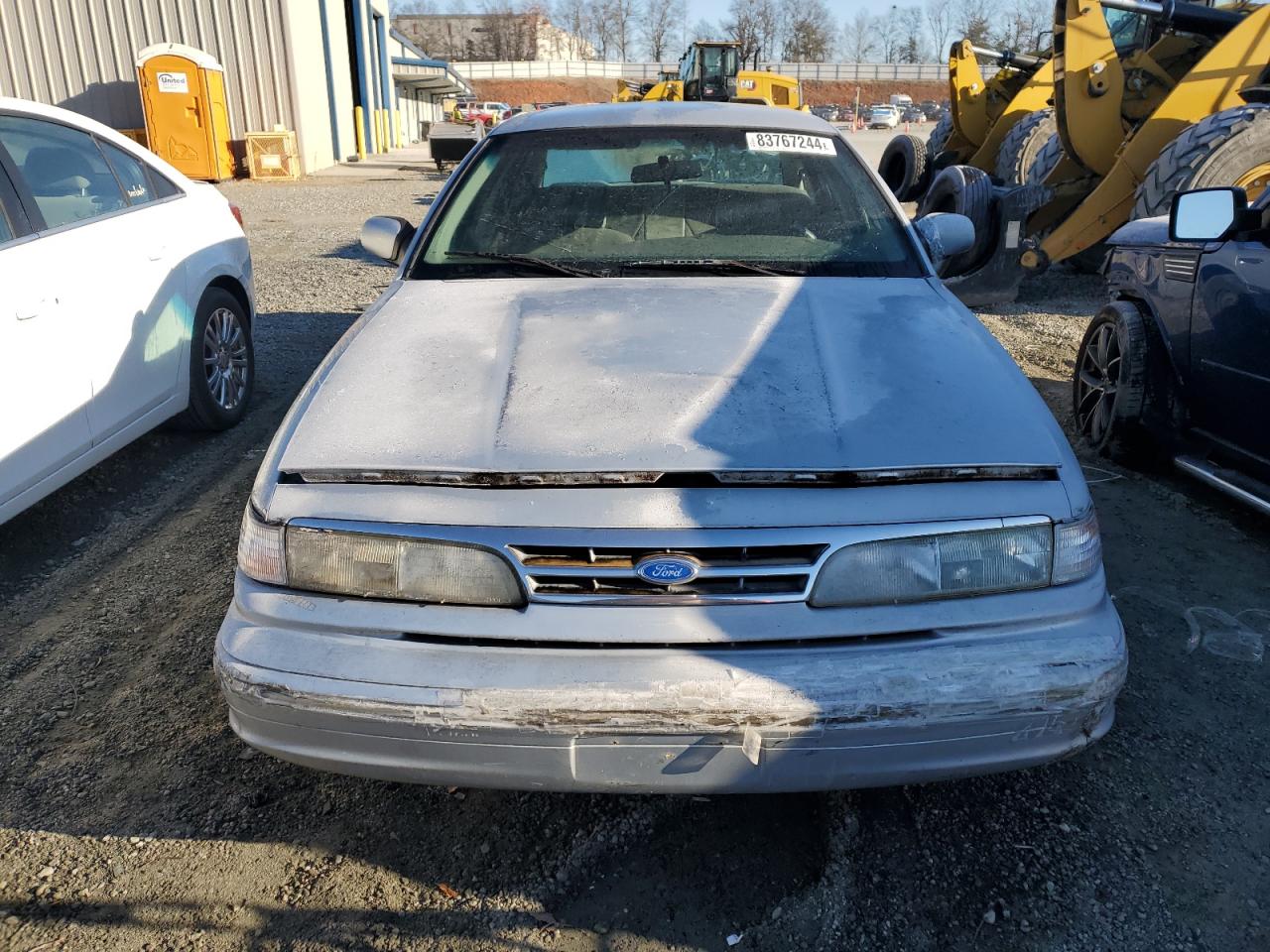 1997 Ford Crown Victoria VIN 2FALP71W6VX187036 Copart auction photo, all over damage thumbnail 5