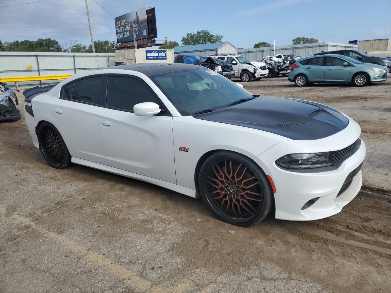 2017 Dodge Charger VIN 2C3CDXGJ7HH529000 Copart auction photo, vandalism damage thumbnail 4