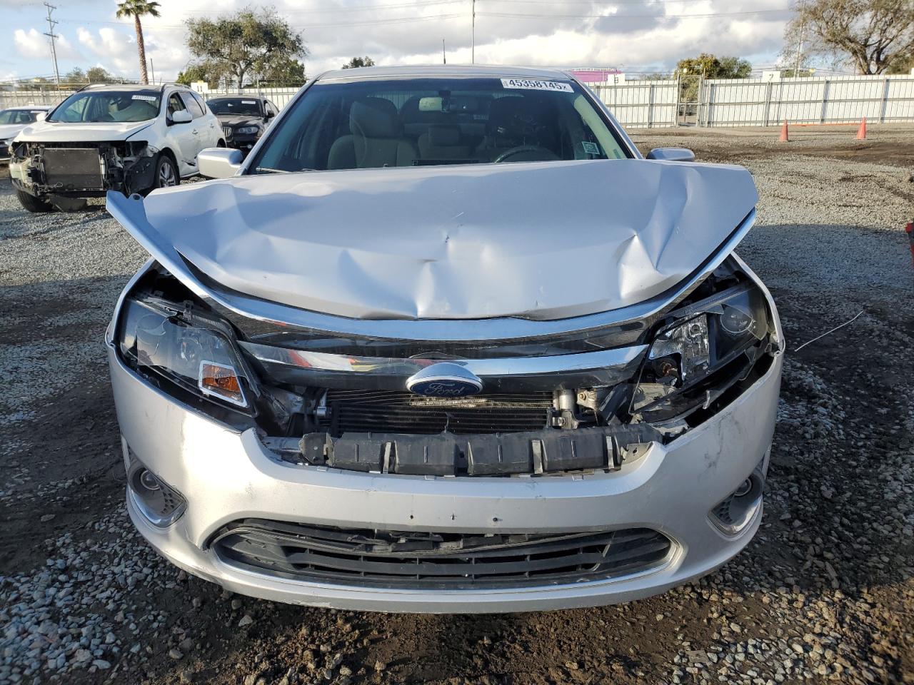2010 Ford Fusion VIN 3FADP0L37AR430716 Copart auction photo, front end / minor dent/scratches damage thumbnail 5