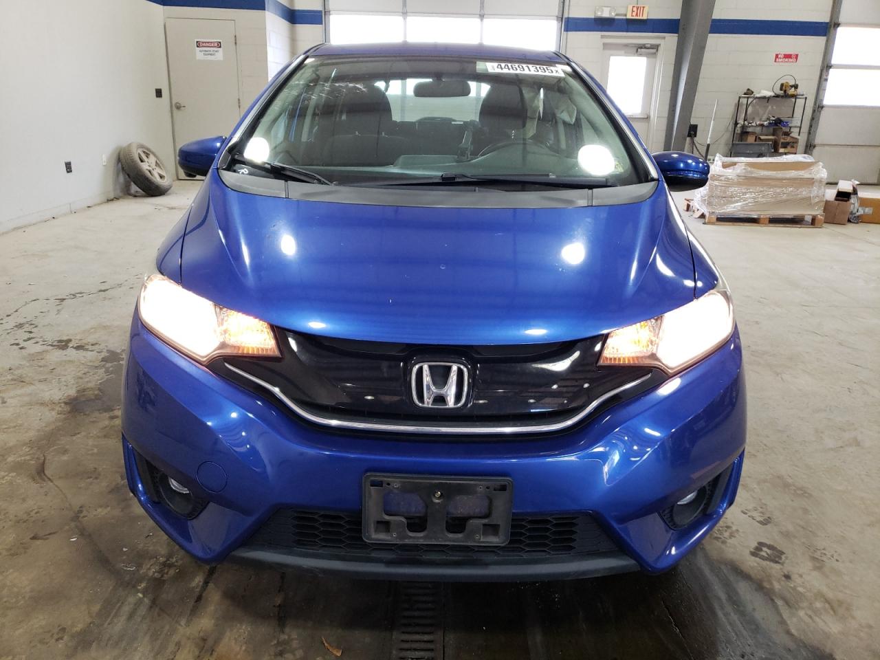 2016 Honda Fit VIN JHMGK5H78GX002523 Copart auction photo, side / rear end damage thumbnail 5