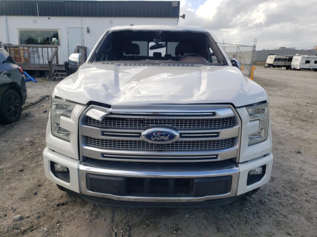 2015 Ford F-150 VIN 1FTEW1CG4FFA23001 Copart auction photo, front end / top/roof damage thumbnail 5