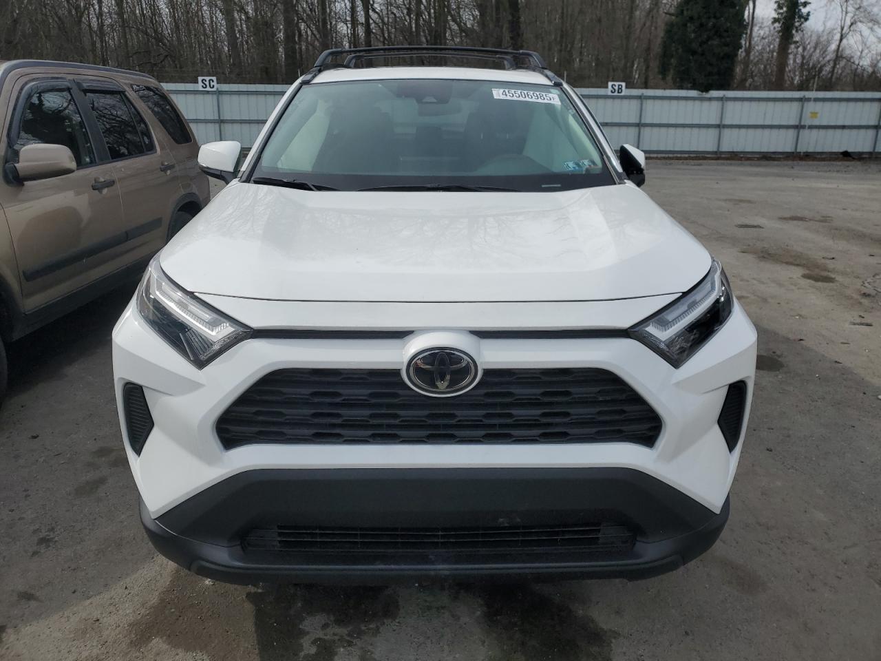 2023 Toyota RAV 4 VIN 2T3P1RFV9PC390400 Copart auction photo, side damage thumbnail 5