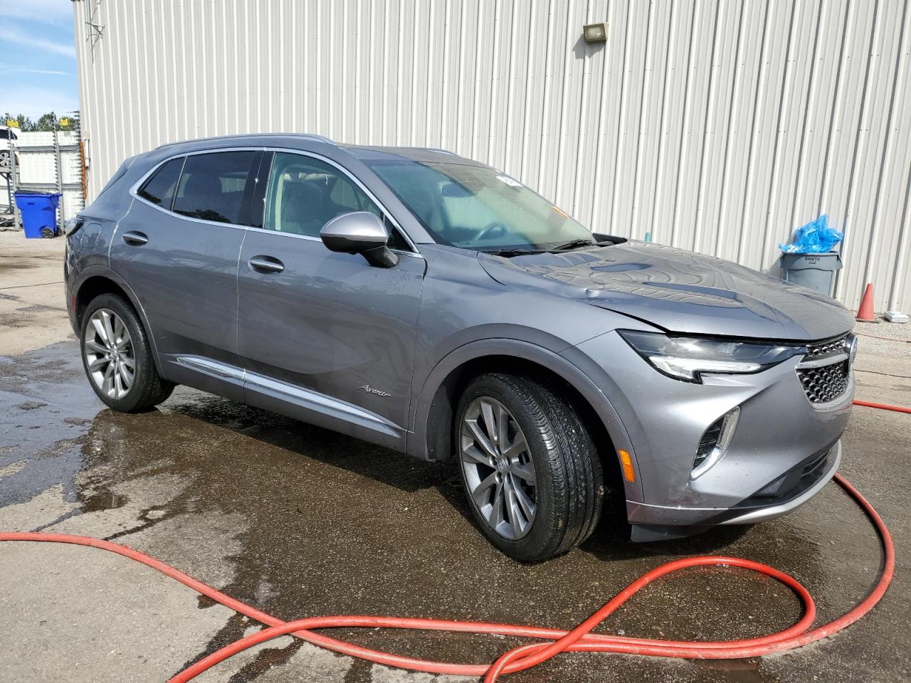 2022 Buick Envision VIN LRBFZRR46ND020181 Copart auction photo, top/roof / water/flood damage thumbnail 4