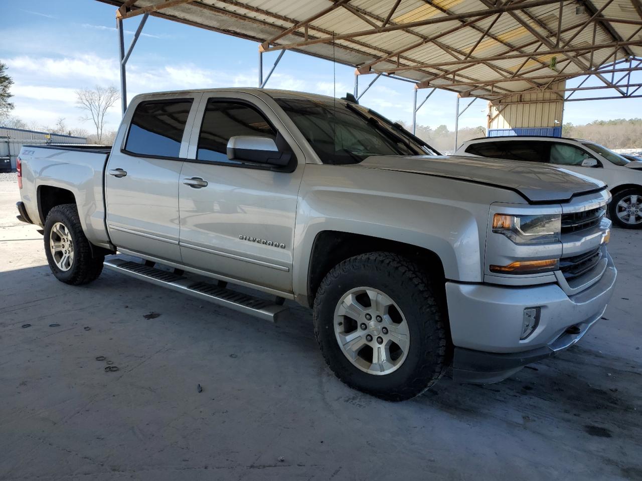 2017 Chevrolet Silverado VIN 3GCUKRECXHG513170 Copart auction photo, burn - interior damage thumbnail 4