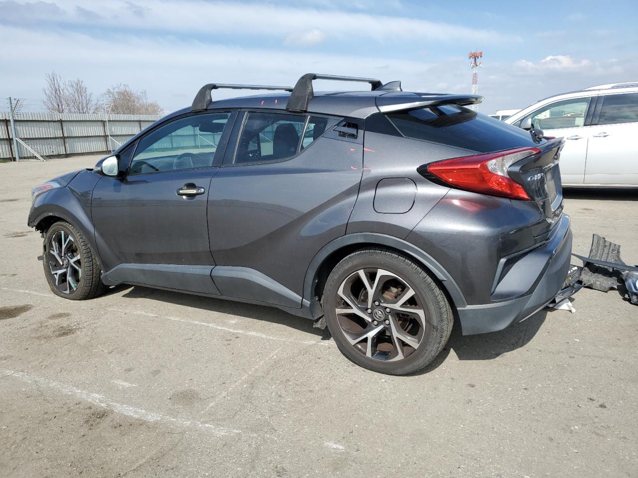 2018 Toyota C-HR VIN NMTKHMBX4JR030599 Copart auction photo, front end / side damage thumbnail 2