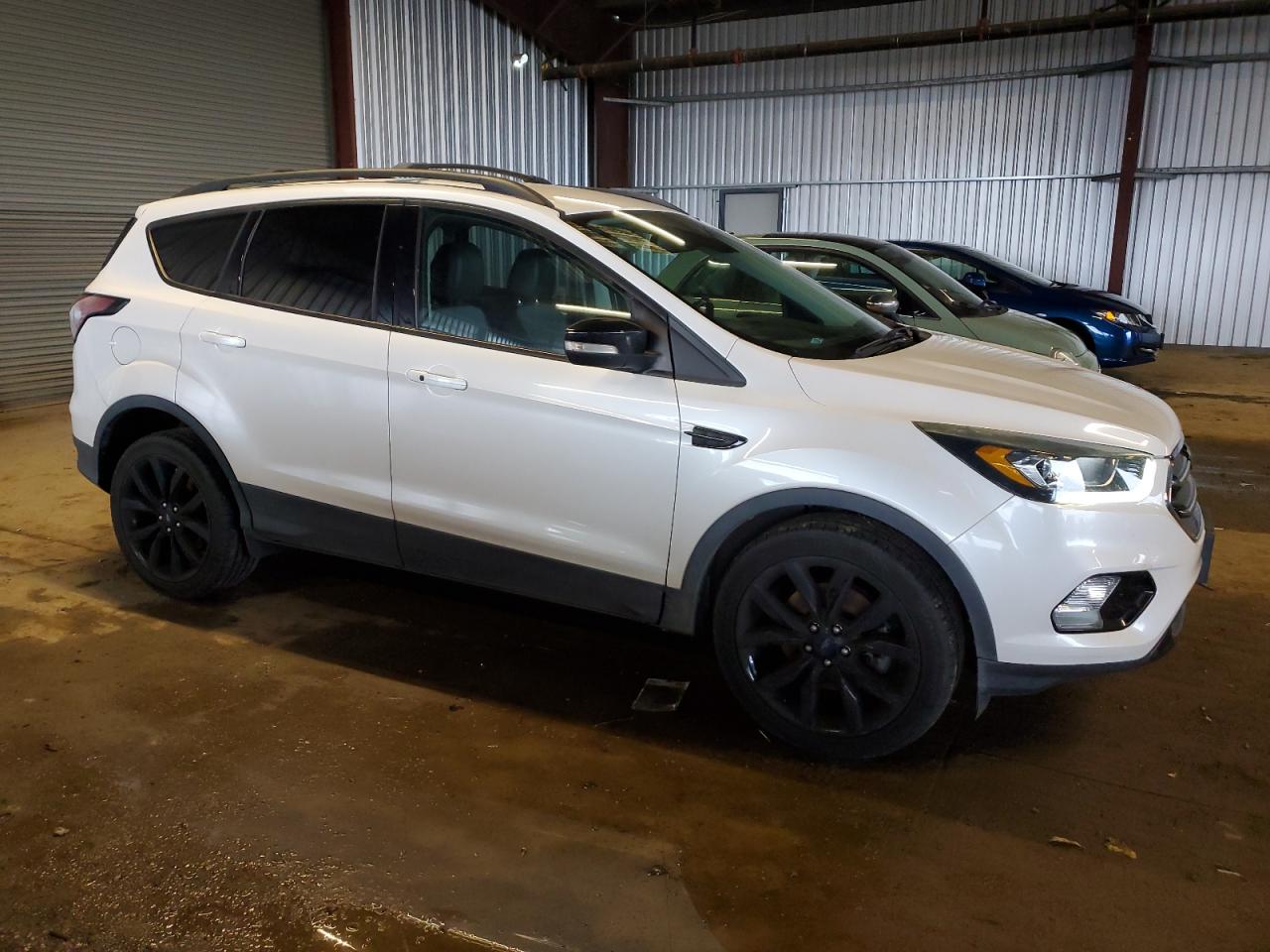 2017 Ford Escape VIN 1FMCU9J95HUC67766 Copart auction photo, mechanical damage thumbnail 4