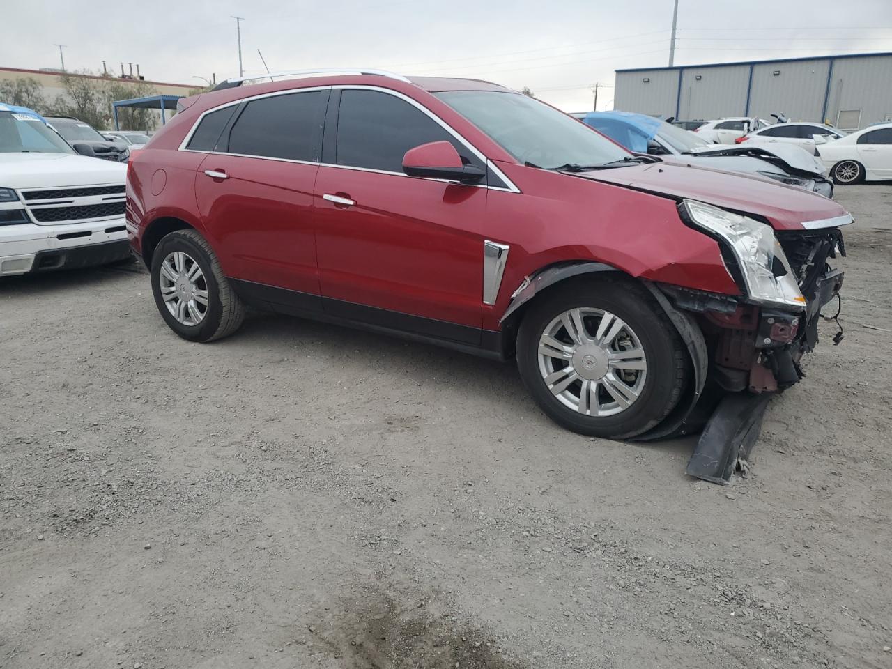 2016 Cadillac SRX VIN 3GYFNBE35GS563343 Copart auction photo, front end damage thumbnail 4