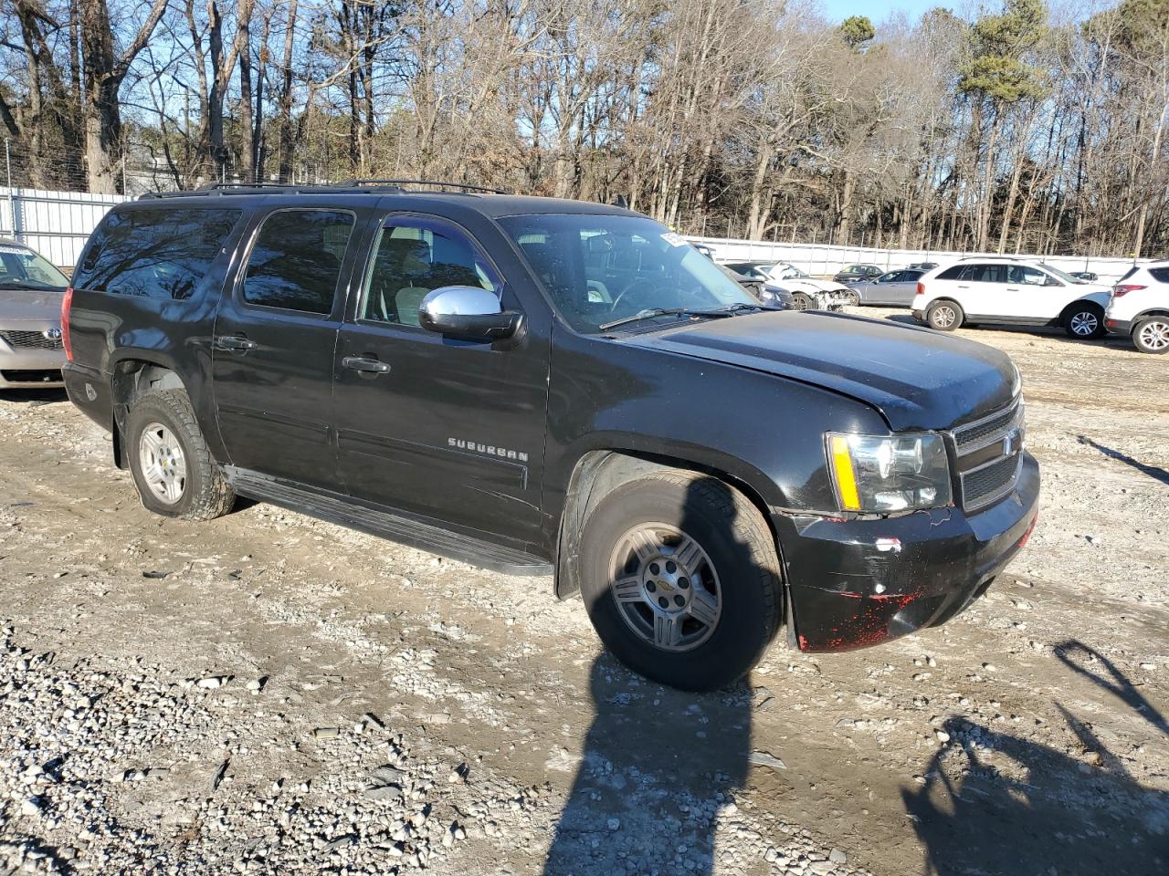 2011 Chevrolet Suburban VIN 1GNSCHE01BR155461 Copart auction photo, front end / rear end damage thumbnail 4