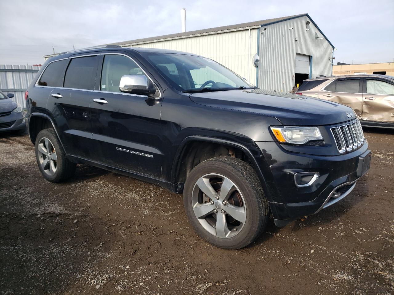 2015 Jeep Grand Cherokee VIN 1C4RJFCTXFC941007 Copart auction photo, rear end damage thumbnail 4