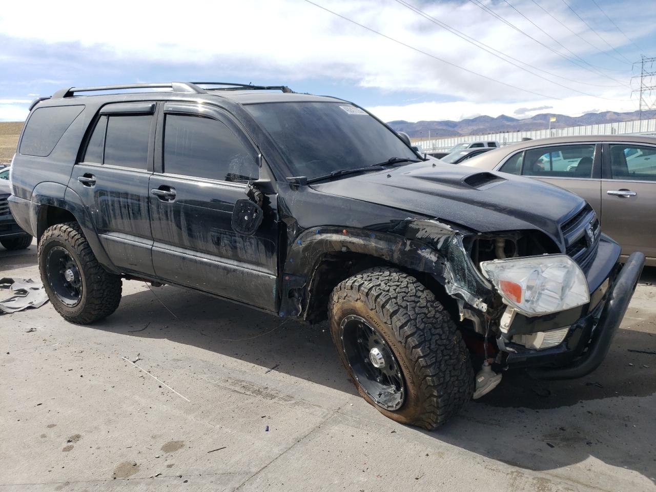 2003 Toyota 4Runner VIN JTEBT14R338004138 Copart auction photo, front end / hail damage thumbnail 4