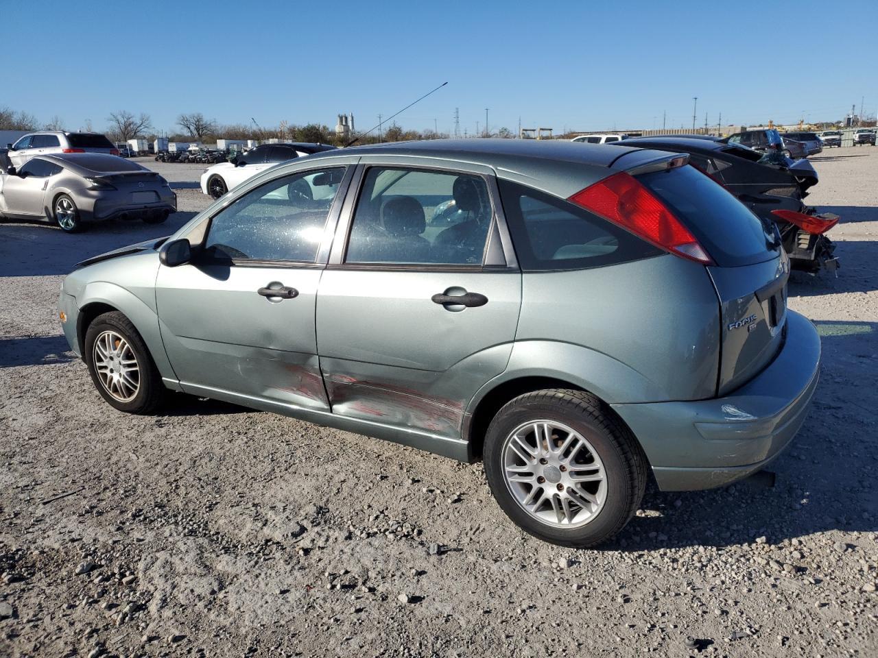 2005 Ford Focus VIN 3FAFP37N05R131645 Copart auction photo, side / all over damage thumbnail 2