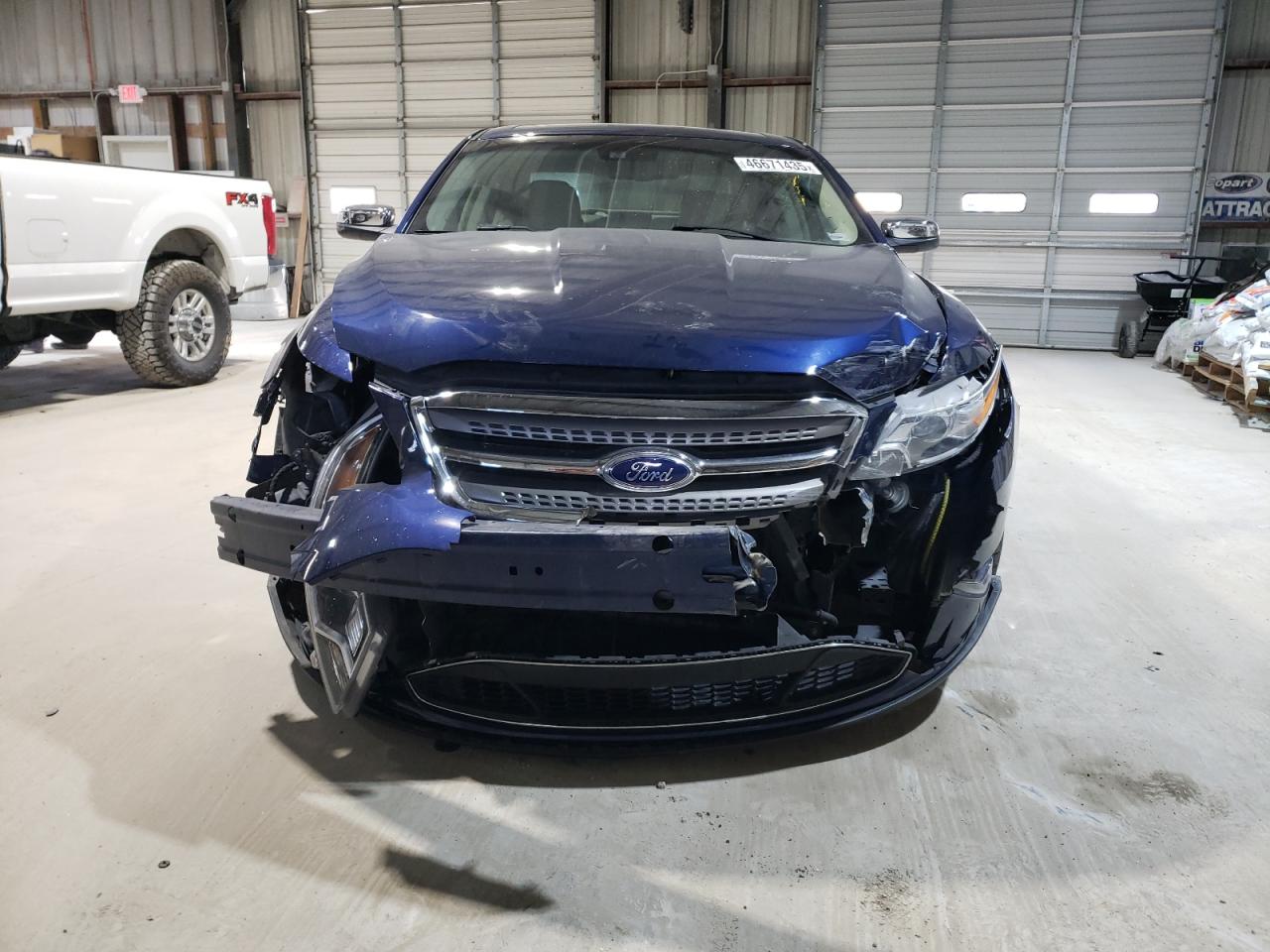 2012 Ford Taurus VIN 1FAHP2JWXCG106552 Copart auction photo, front end / minor dent/scratches damage thumbnail 5