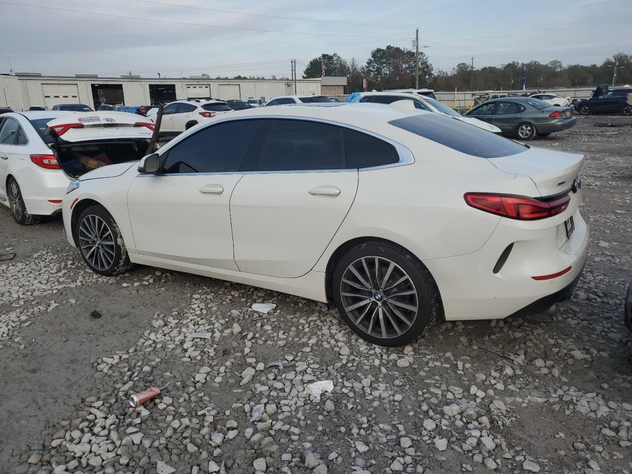 2022 BMW 2er VIN WBA73AK0XN7L08006 Copart auction photo, side / front end damage thumbnail 2