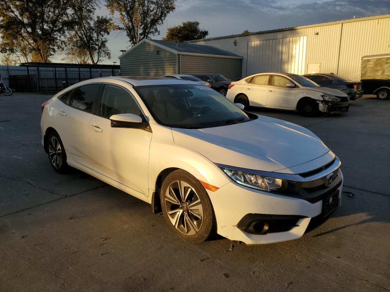 2017 Honda Civic VIN 19XFC1F33HE201855 Copart auction photo, front end damage thumbnail 4