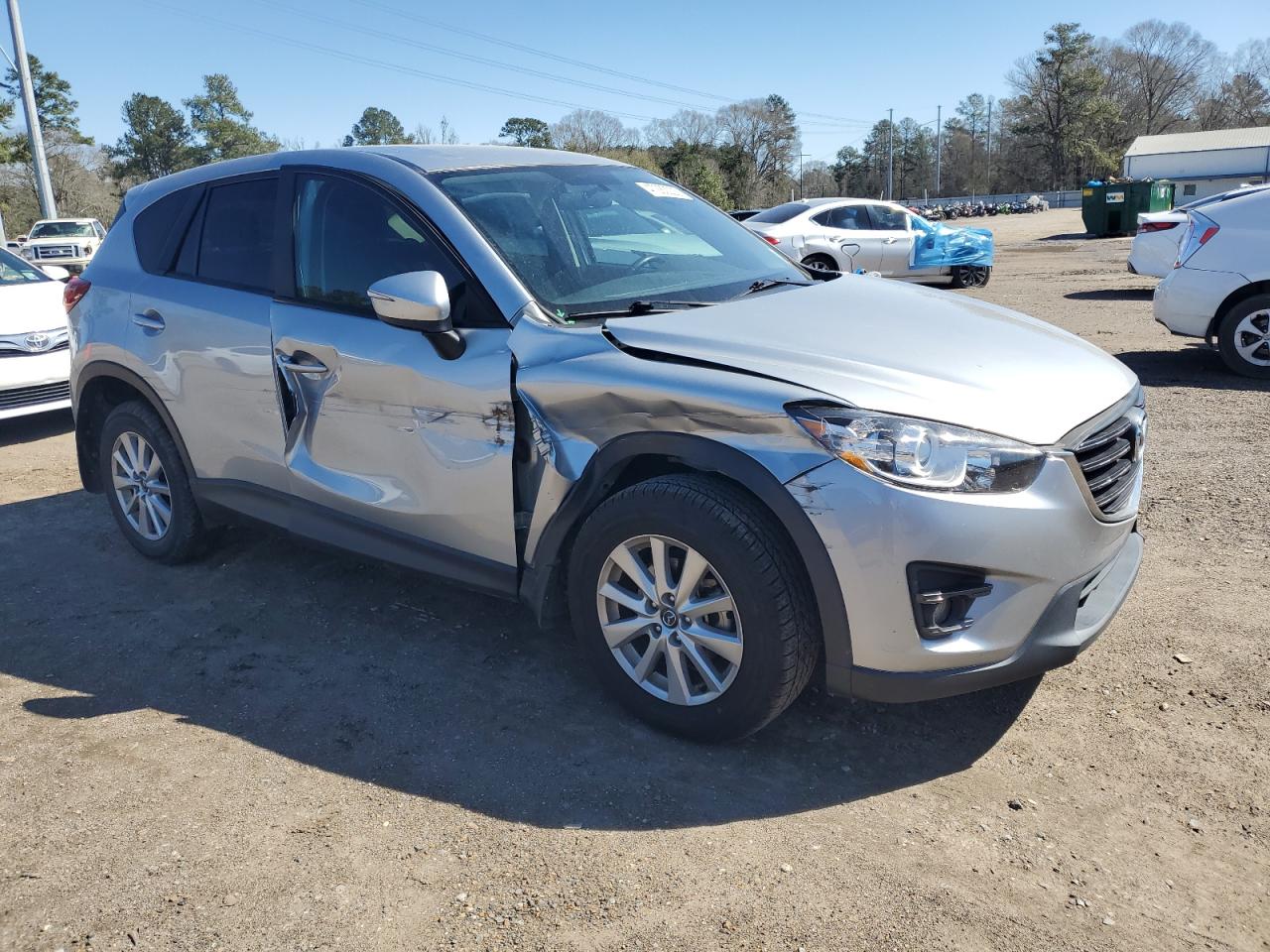 2016 Mazda CX-5 VIN JM3KE2CY7G0918787 Copart auction photo, side / minor dent/scratches damage thumbnail 4