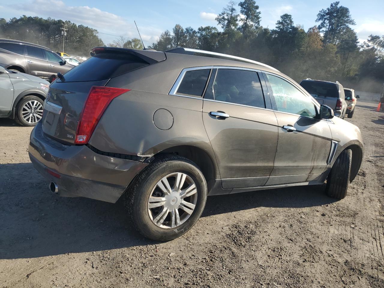 2016 Cadillac SRX VIN 3GYFNBE30GS527995 Copart auction photo, undercarriage damage thumbnail 3