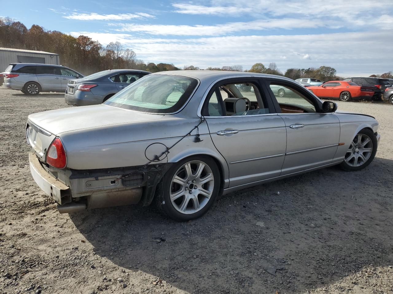 2004 Jaguar XJ VIN SAJWA74C94SG23829 Copart auction photo, side / undercarriage damage thumbnail 3