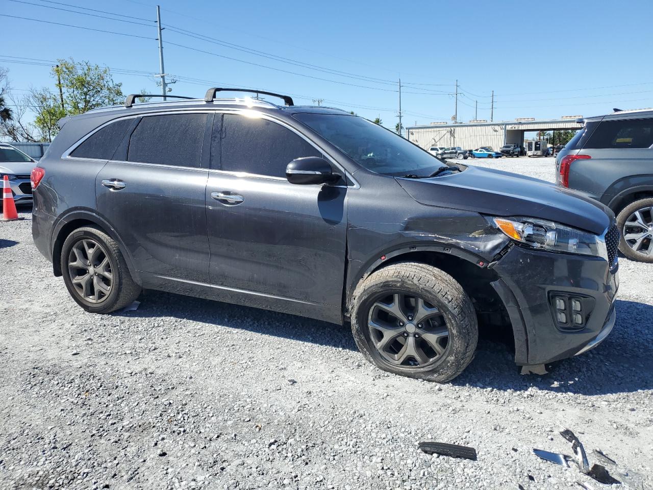 2016 KIA Sorento VIN 5XYPK4A14GG119844 Copart auction photo, front end / top/roof damage thumbnail 4