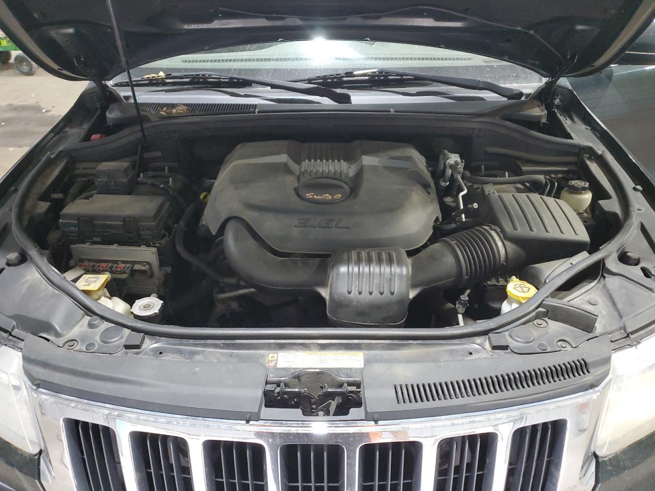 2011 Jeep Grand Cherokee VIN 1J4RR4GG8BC669264 Copart auction photo, side damage thumbnail 12