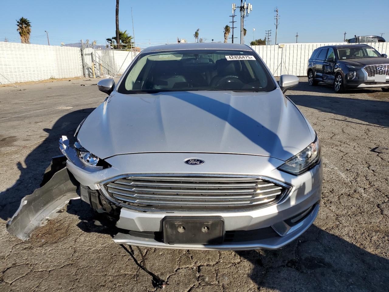 2017 Ford Fusion VIN 3FA6P0HD3HR275781 Copart auction photo, front end / side damage thumbnail 5