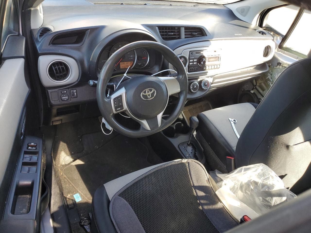 2012 Toyota Yaris VIN JTDKTUD30CD516562 Copart auction photo, all over damage thumbnail 8