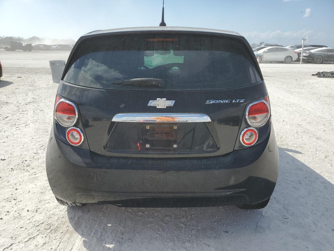 2012 Chevrolet Sonic VIN 1G1JE6SH9C4130554 Copart auction photo, top/roof damage thumbnail 6