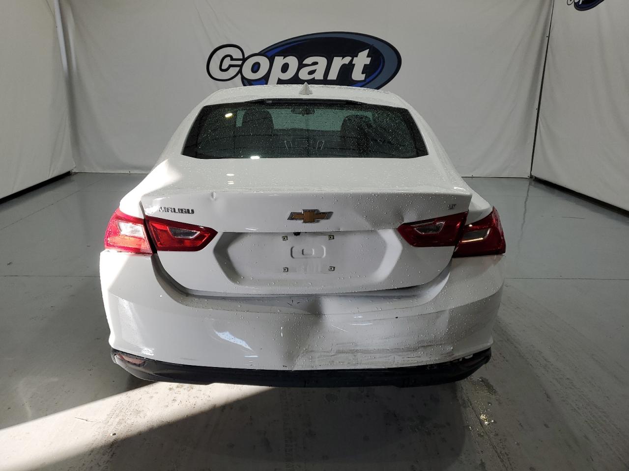 2023 Chevrolet Malibu VIN 1G1ZD5STXPF213084 Copart auction photo, rear end / minor dent/scratches damage thumbnail 6