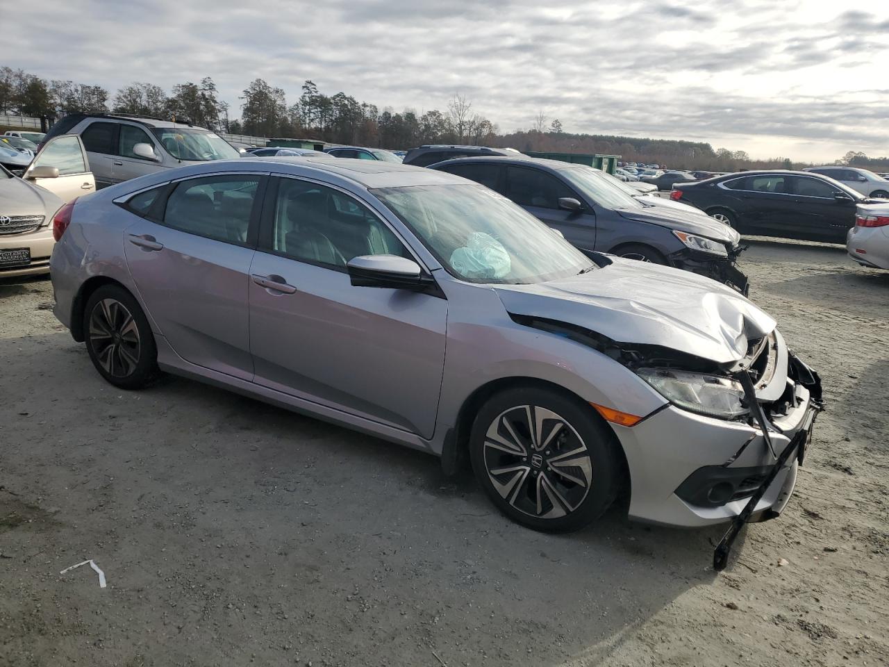2017 Honda Civic VIN 2HGFC1F75HH636756 Copart auction photo, front end damage thumbnail 4