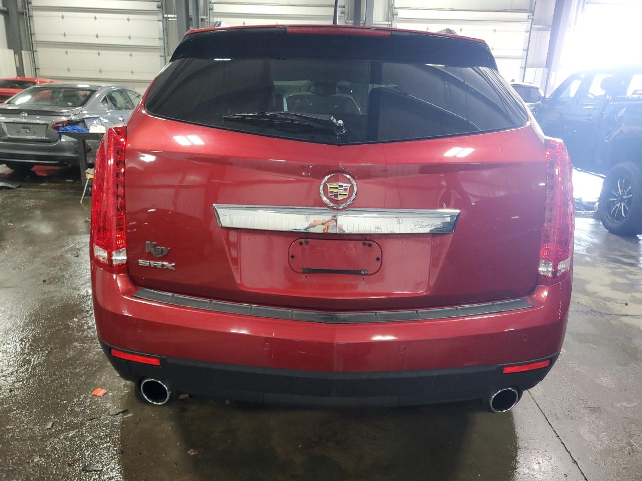 2010 Cadillac SRX VIN 3GYFNAEY5AS590121 Copart auction photo, side / front end damage thumbnail 6