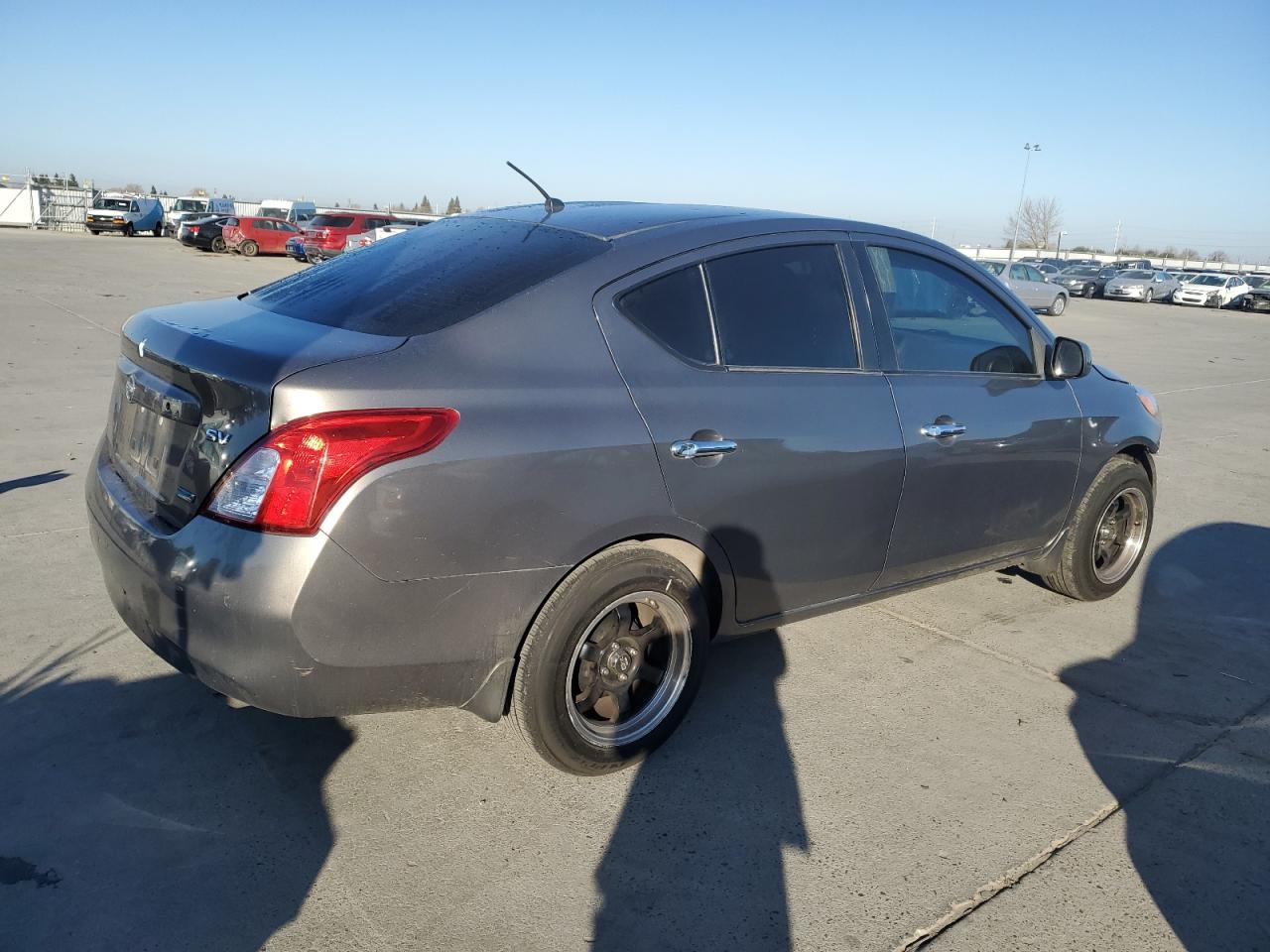 2012 Nissan Versa VIN 3N1CN7APXCL847671 Copart auction photo, front end damage thumbnail 3