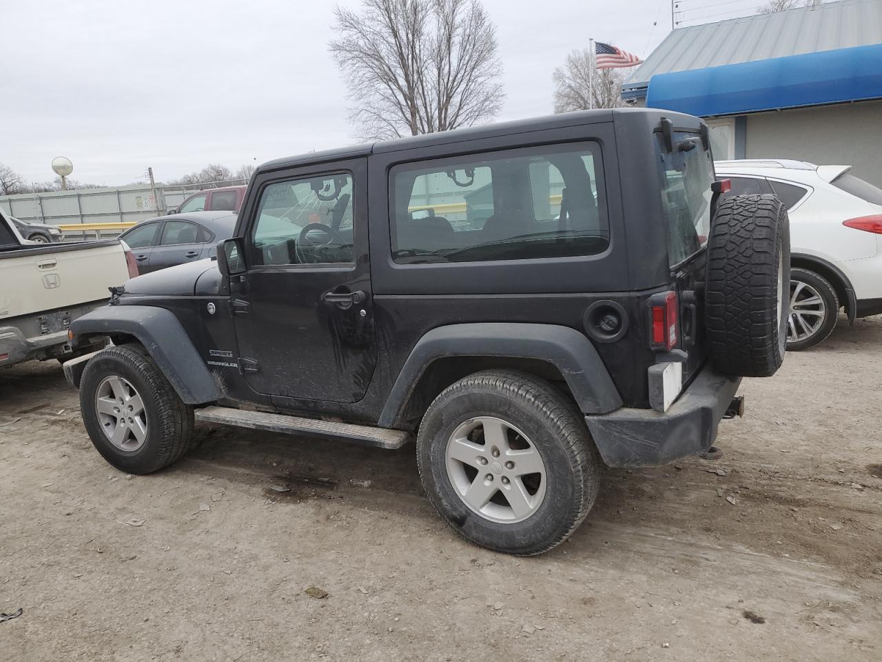 2016 Jeep Wrangler VIN 1C4AJWAGXGL313999 Copart auction photo, front end / side damage thumbnail 2