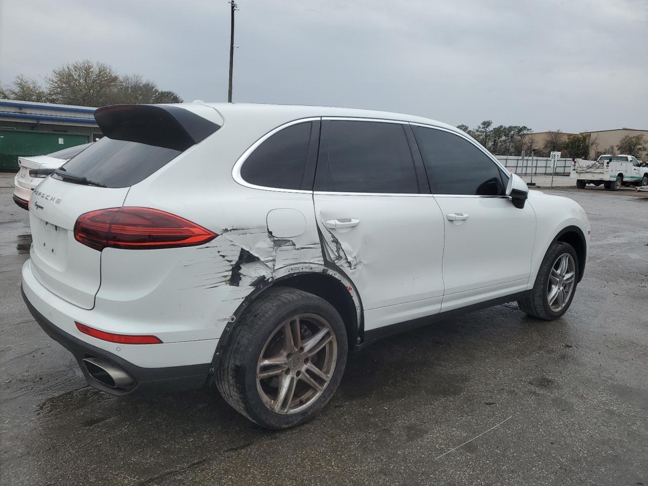 2016 Porsche Cayenne VIN WP1AA2A28GKA10883 Copart auction photo, side / rear end damage thumbnail 3