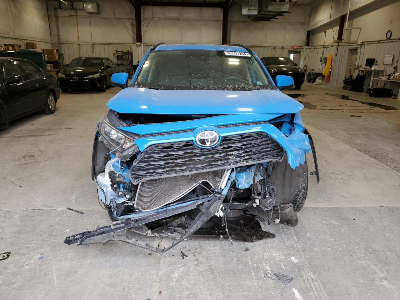 2019 Toyota RAV 4 VIN JTMP1RFVXKD018861 Copart auction photo, front end damage thumbnail 5